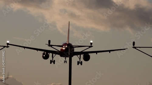 A plane comes in to land at Heathrow airport