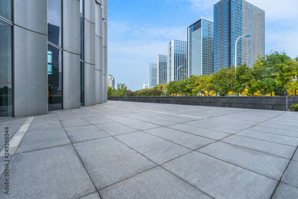 Fototapeta premium modern office buildings with empty square floor