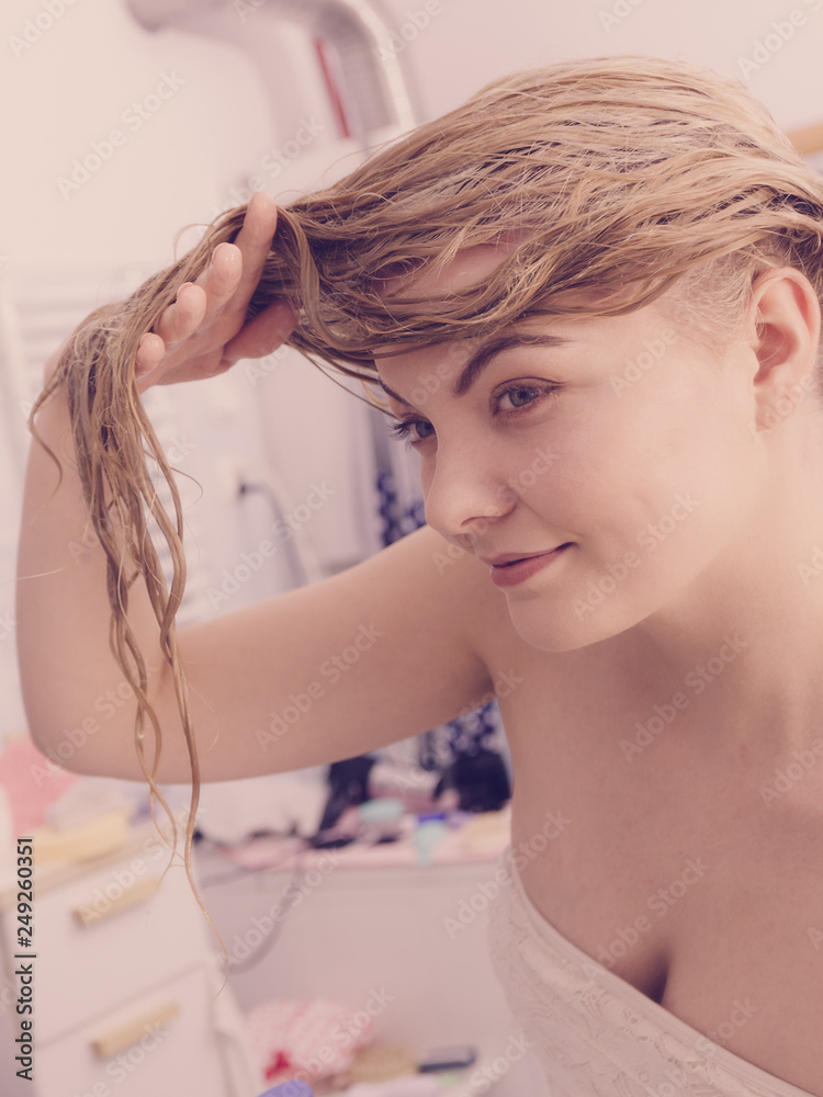 Naklejka premium Woman with wet blonde hair