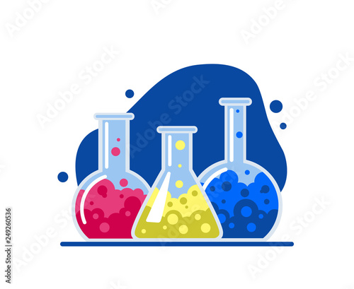 Three glass flasks with multi-colored chemical liquids