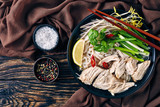 soup Pho Ga with chicken breast, flatlay