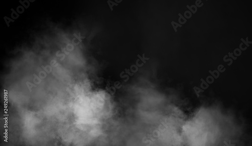 Smoke on floor . Isolated black background . Misty fog effect texture overlays for text or space © Victor