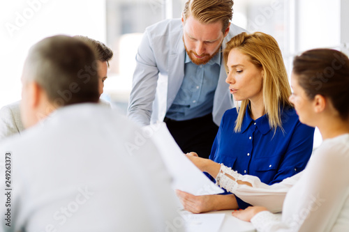 Group of business people working as team in office