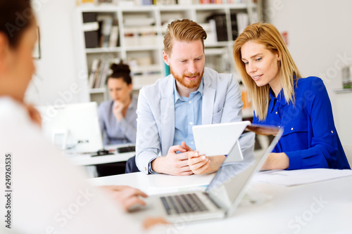 Group of business people working as team in office