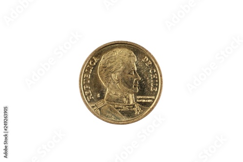 A macro image of a gold Chilean ten peso coin isolated on a white background