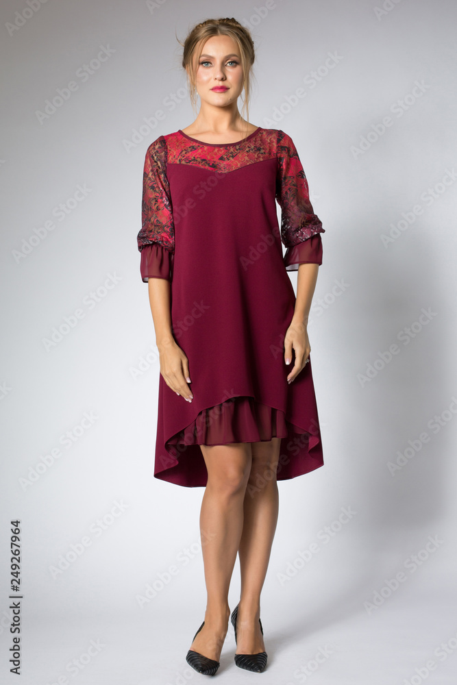 Beautiful model posing in fashion red dress Beautiful model posing in fashion red dress