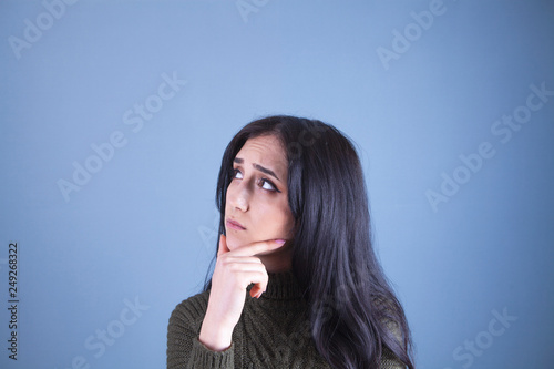 pensive girl looking up