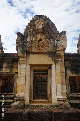 A windows of the gallery of the ancient Khmer temple Prasat Sdok Kok Thom built of red sandstone and laterite in Sa Kaeo province of Thailand