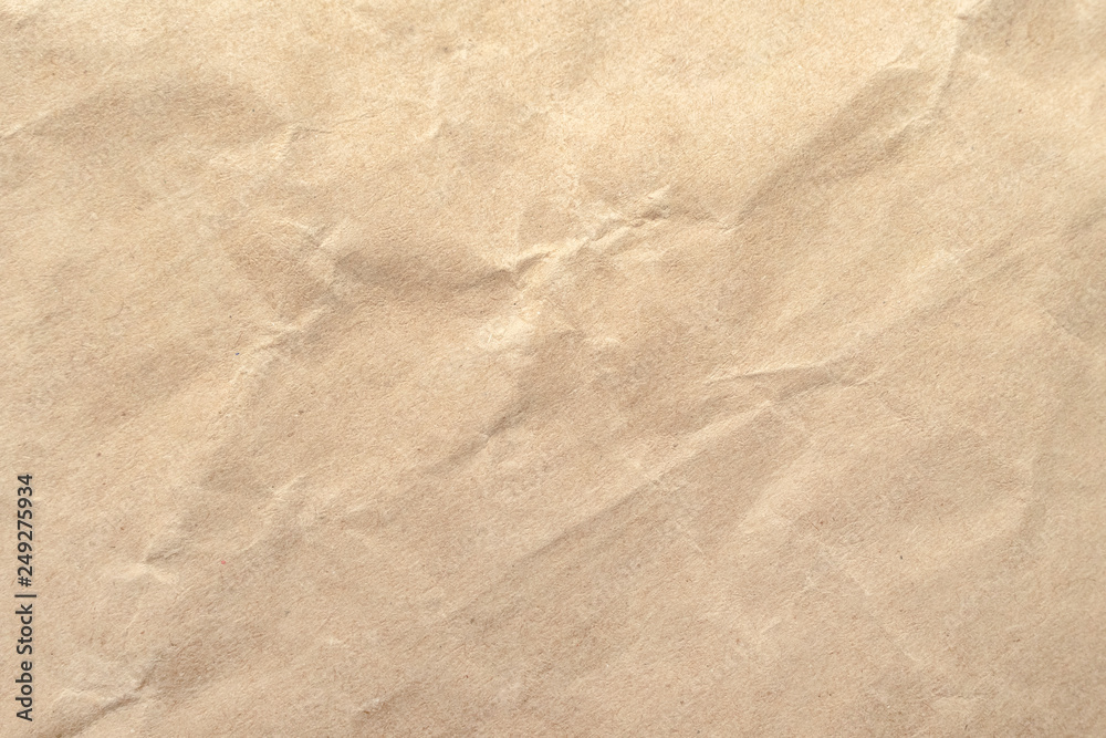 Naklejka premium Brown crumpled paper texture background.
