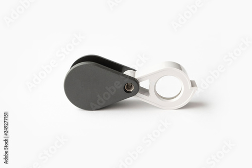 Magnifying glass for diamonds or see the amulet Isolated on a White Background.