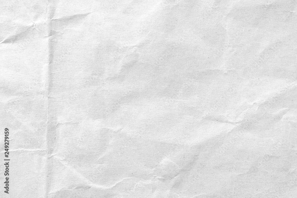 White crumpled paper texture background. Close-up. White crumpled paper texture background. Close-up.