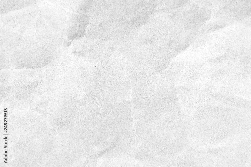 White crumpled paper texture background. Close-up. White crumpled paper texture background. Close-up.