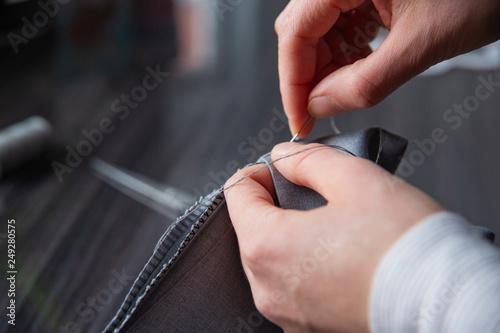 Close up of woman hand sewing