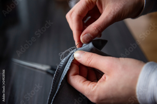 Close up of woman hand sewing