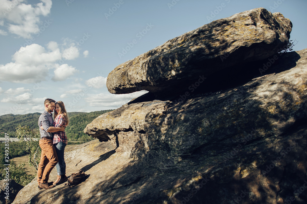 Fototapeta premium Happy young couple in mountain.