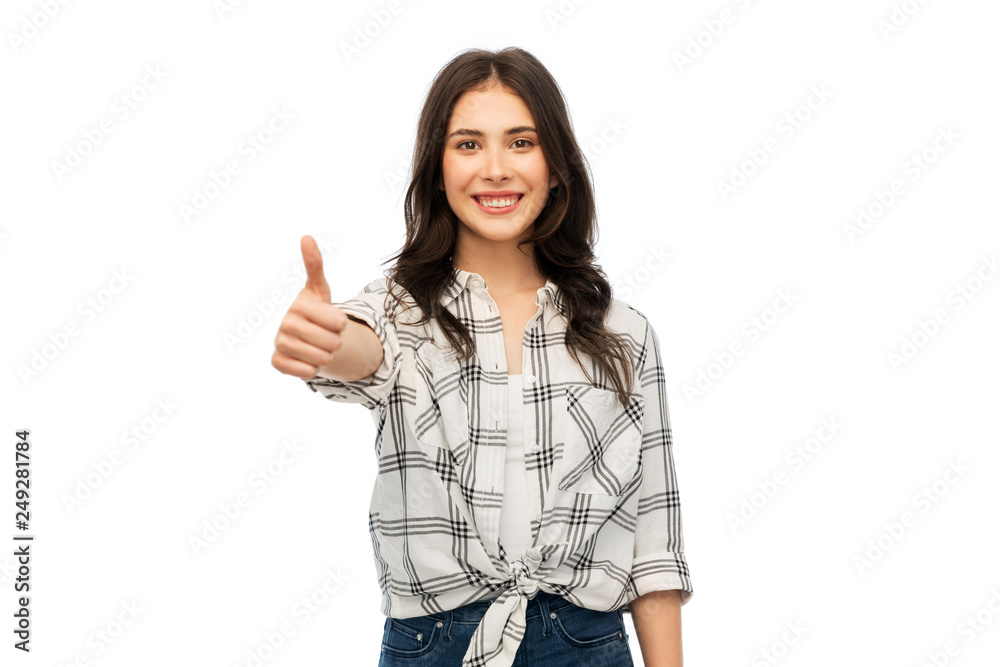 gesture and people concept - happy smiling young woman or teenage girl in checkered shirt showing thumbs up over white background gesture and people concept - happy smiling young woman or teenage girl in checkered shirt showing thumbs up over white background