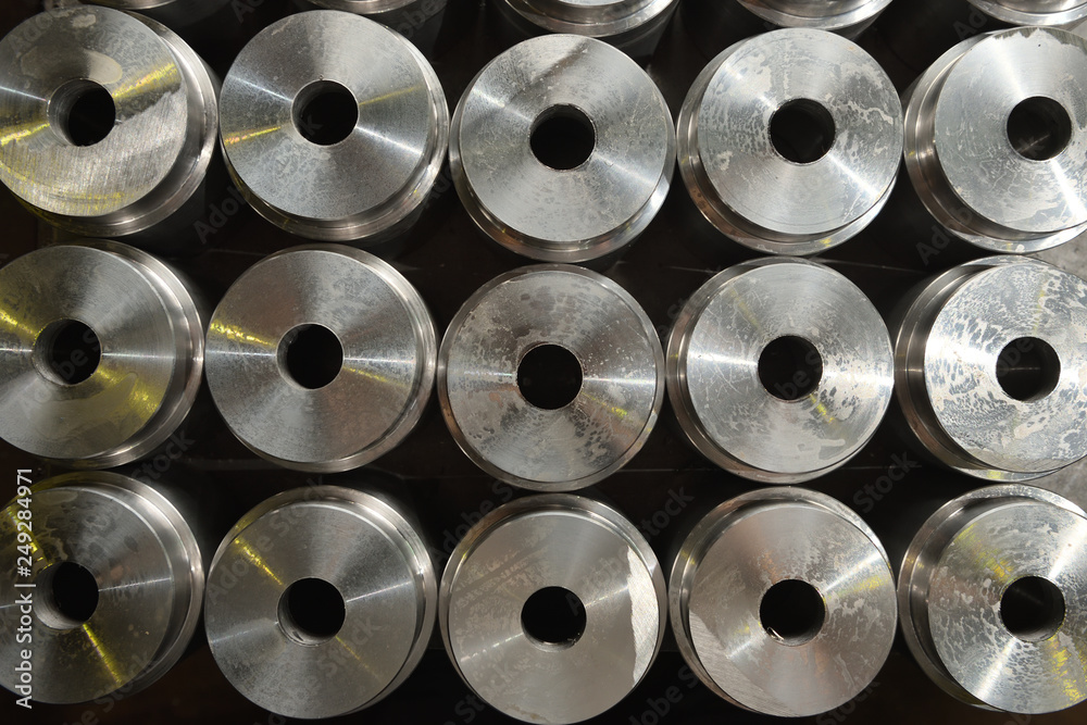 The texture of the round parts with a hole in the center at the plant for the production of valves