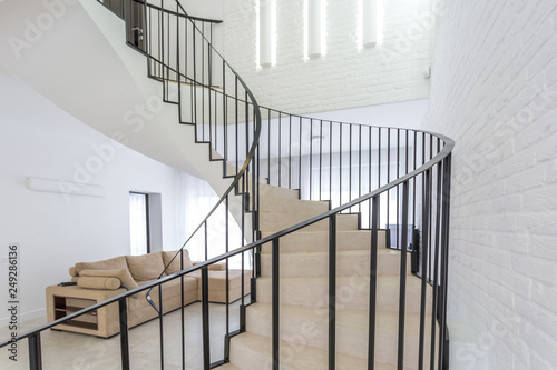 spiral staircase in bright interior