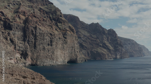 Aerial survey above the Atlantic Ocean in Tenerife, Canary islands, the rocks Los Gigantos