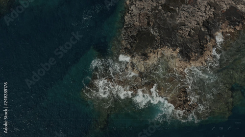 Aerial survey above the Atlantic Ocean in Tenerife, Canary islands, the rocks Los Gigantos