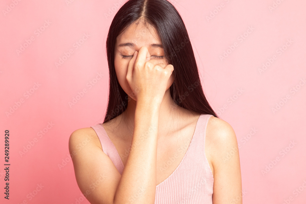 Young Asian woman got sick and headache. Young Asian woman got sick and headache.