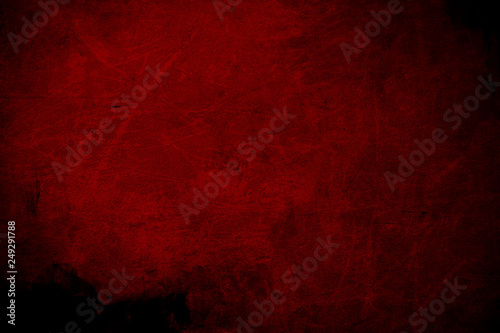 Old red scratched wall  grungy background or texture