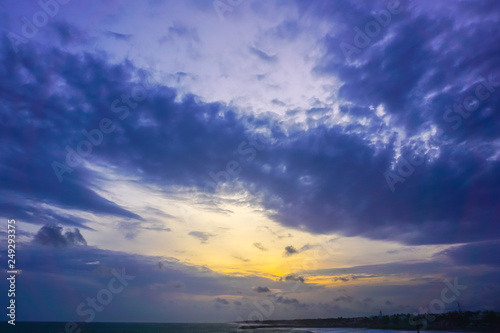 Beautiful sunset and sky with clouds over the Indian Ocean. Kanyakumari, India