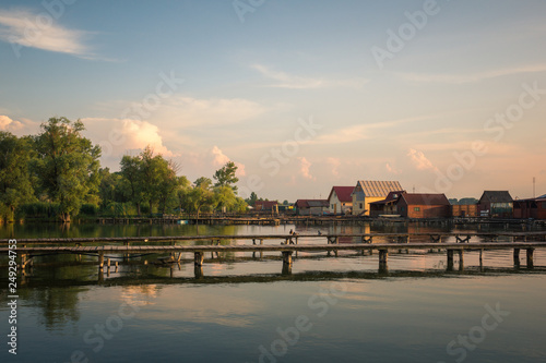 Wooden cottages on the Bokod lake in Hungary photo