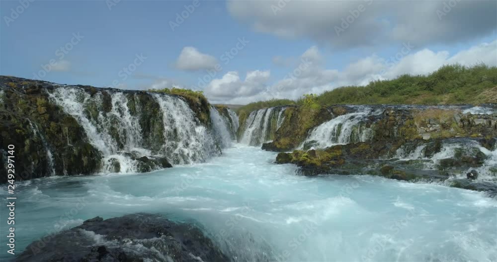 Flying low into Bruarfoss waterfall Iceland sunny day drone aerial.mov Flying low into Bruarfoss waterfall Iceland sunny day drone aerial.mov