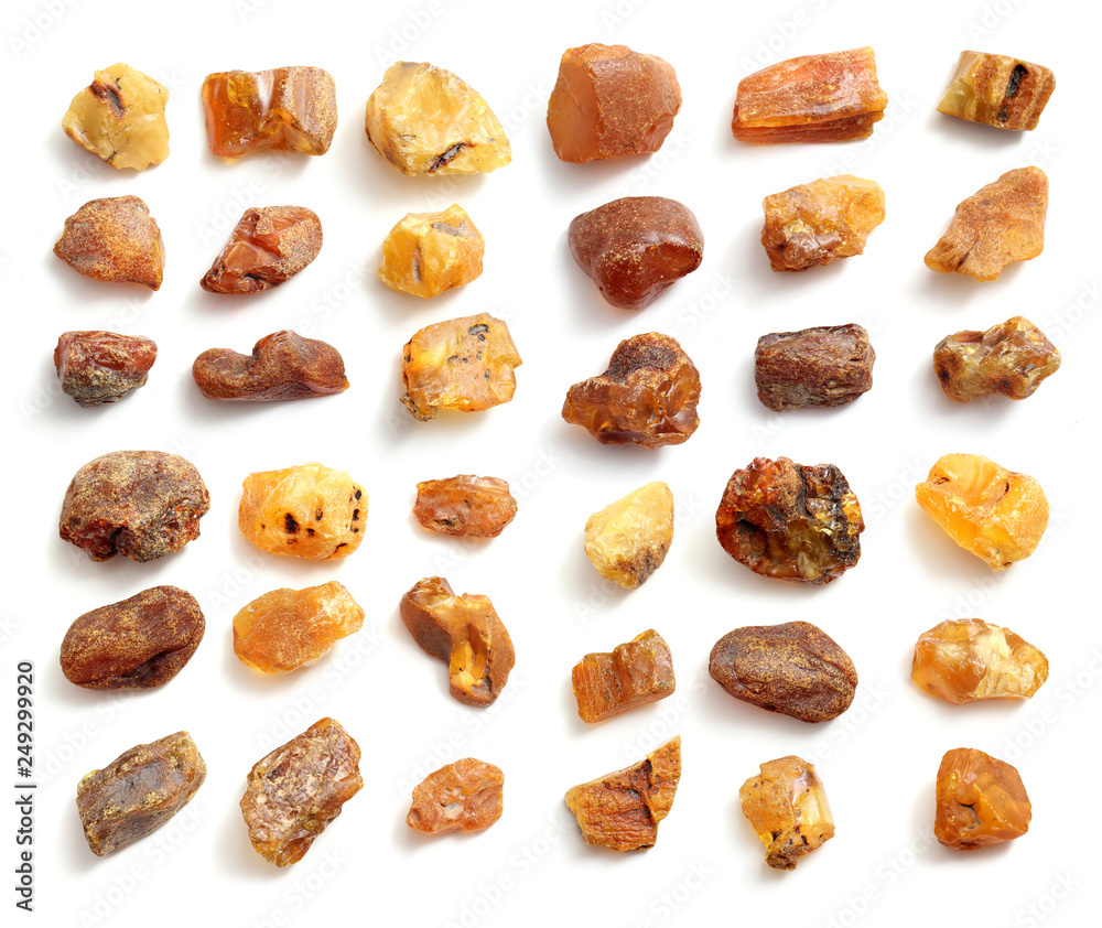 Natural raw amber stone isolated on white background. Multiple amber  gemstone in various shapes and colour. Jewelry components. Stock Photo |  Adobe Stock