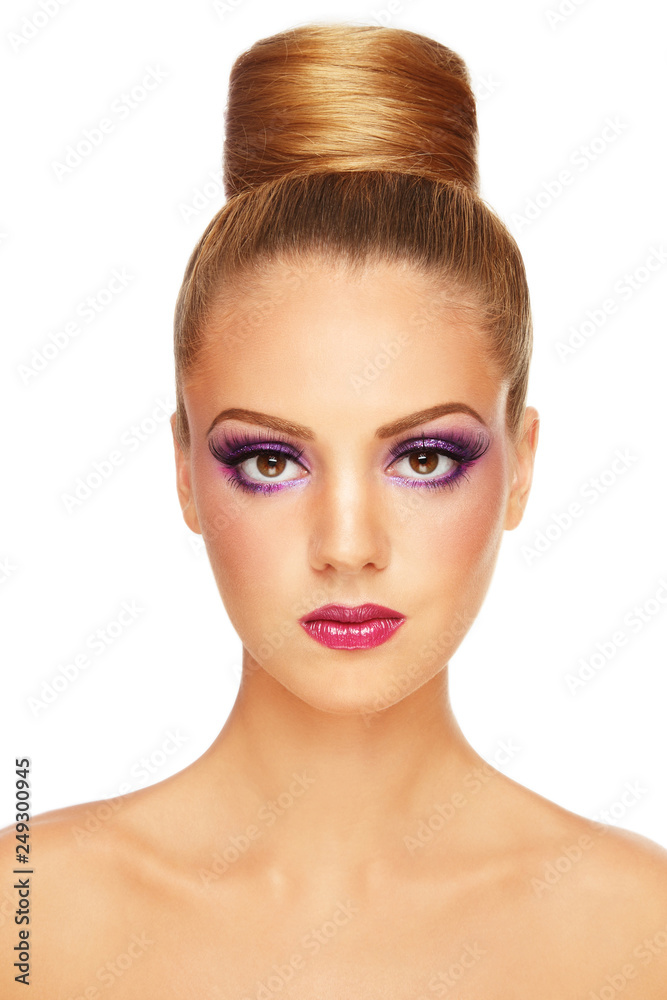 Portrait of young beautiful girl with fancy violet make-up and hair bun Portrait of young beautiful girl with fancy violet make-up and hair bun