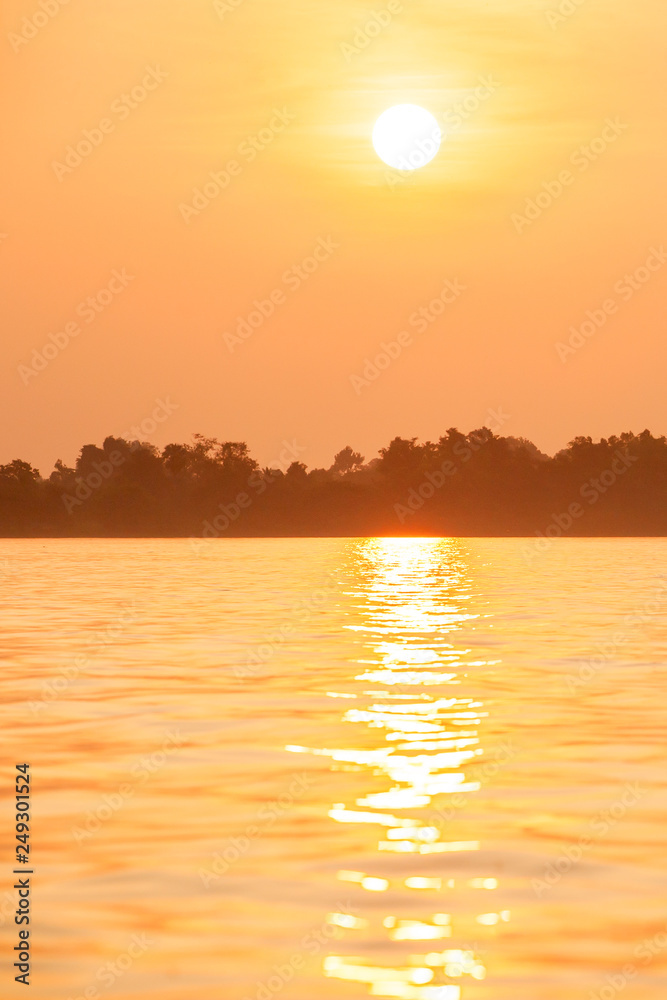 Golden sunset on Mekong River.