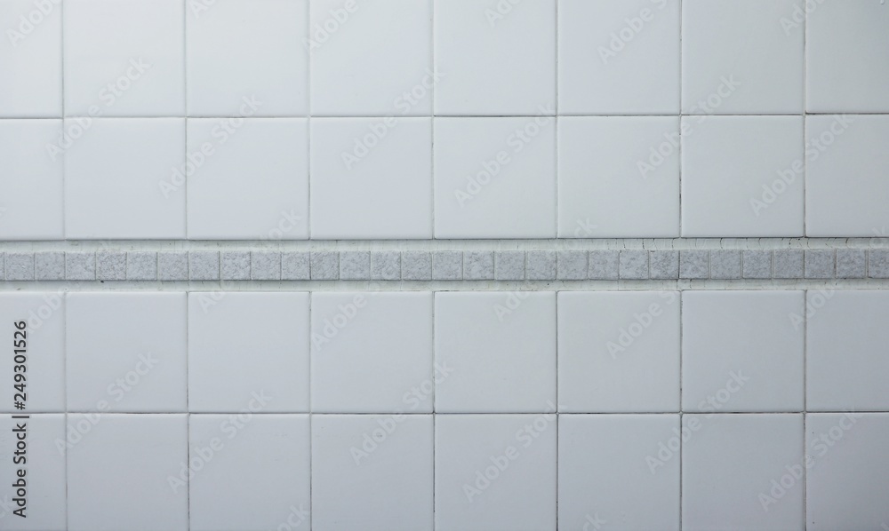 white ceramic wall tiles texture in the bathroom
