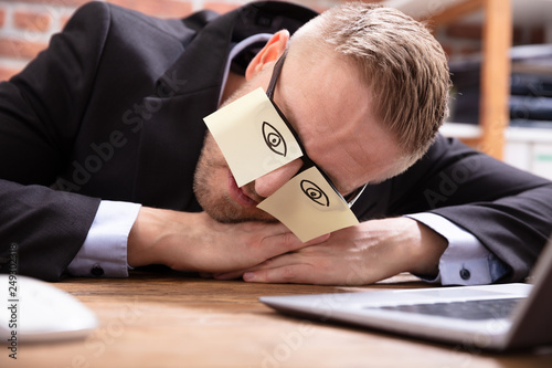 Man Covering Her Eyes With Adhesive Notes