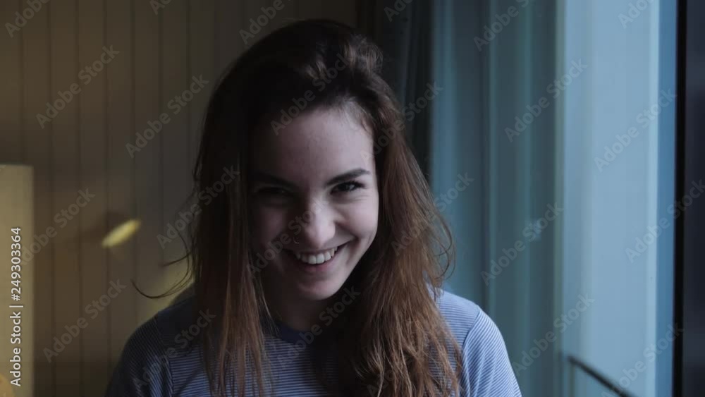 Young Woman Covering Eye With Fingers Young Woman Covering Eye With Fingers