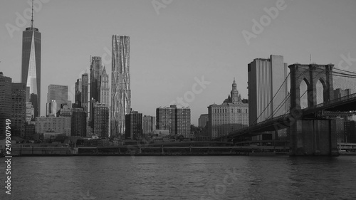 black and white view of east river and Brooklyn Bridge and Manhattan, New York City, USA © WADII