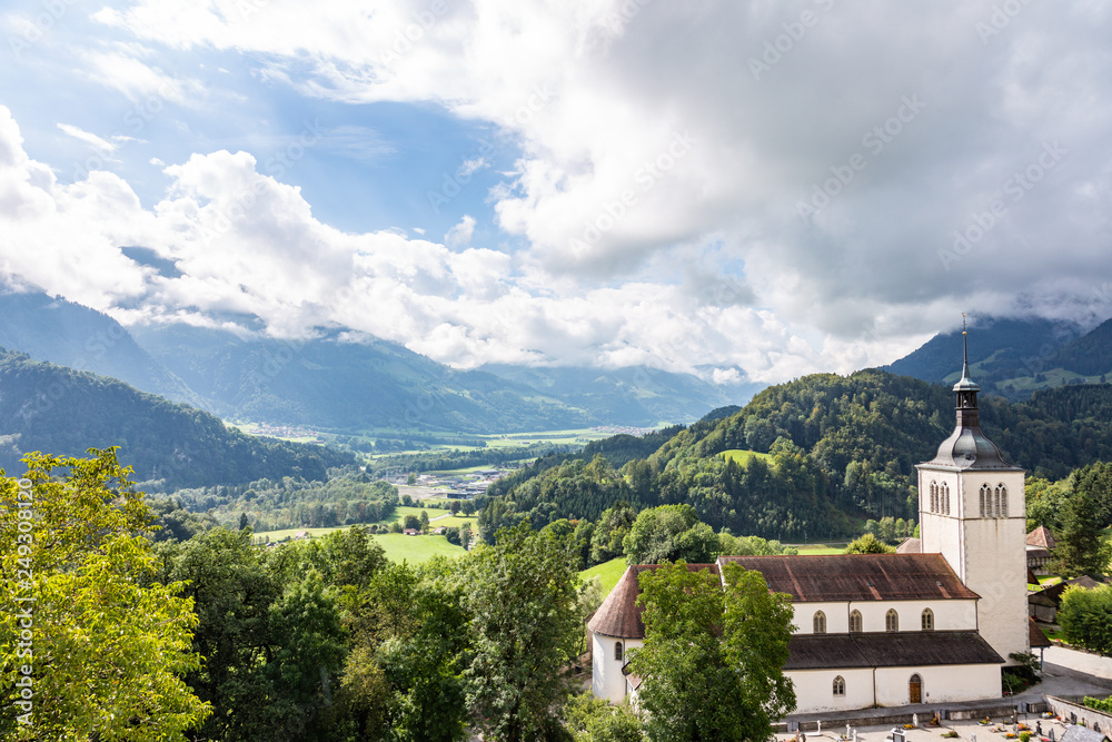 View of the valley and St. Theodula's Church from Castle Gruyeres, Switzerland