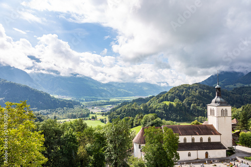 View of the valley and St. Theodula's Church from Castle Gruyeres, Switzerland