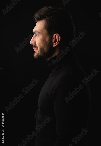 profile portrait of a bearded man © spaxiax