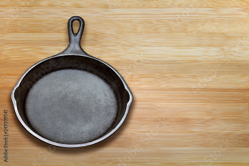Cast Iron skillet on wooden board