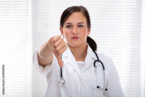 Doctor Showing Thumb Down Sign