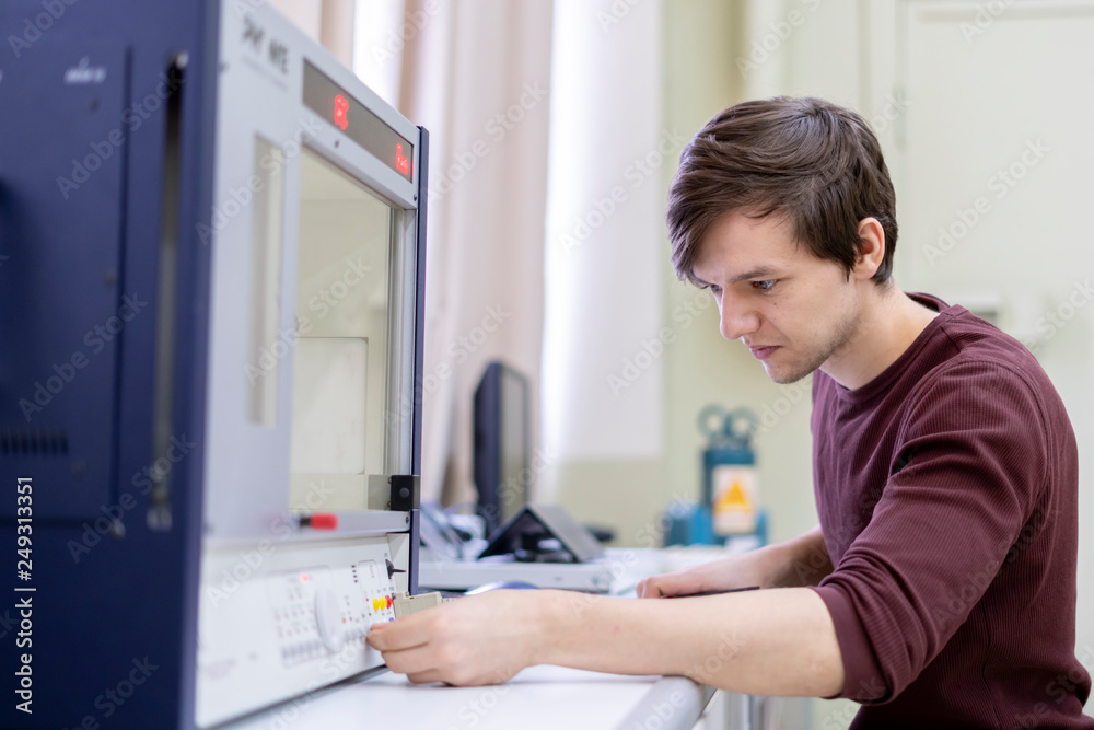Fototapeta premium student conduct experiments in school laboratory b
