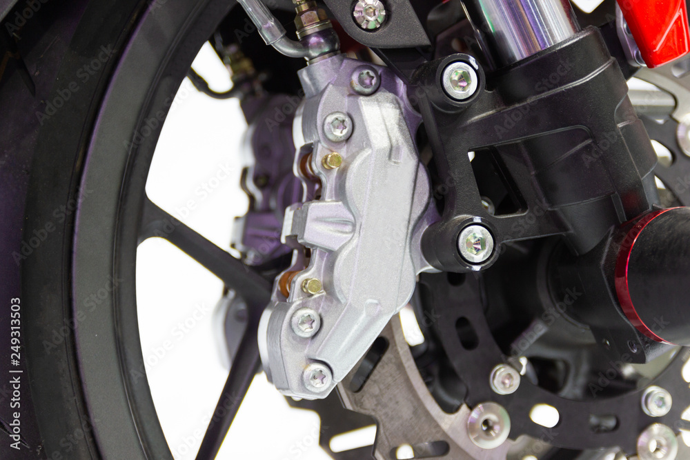 Close up - Detail Motorcycle brake disc and front wheel is part of the motorcycle. Close up - Detail Motorcycle brake disc and front wheel is part of the motorcycle.