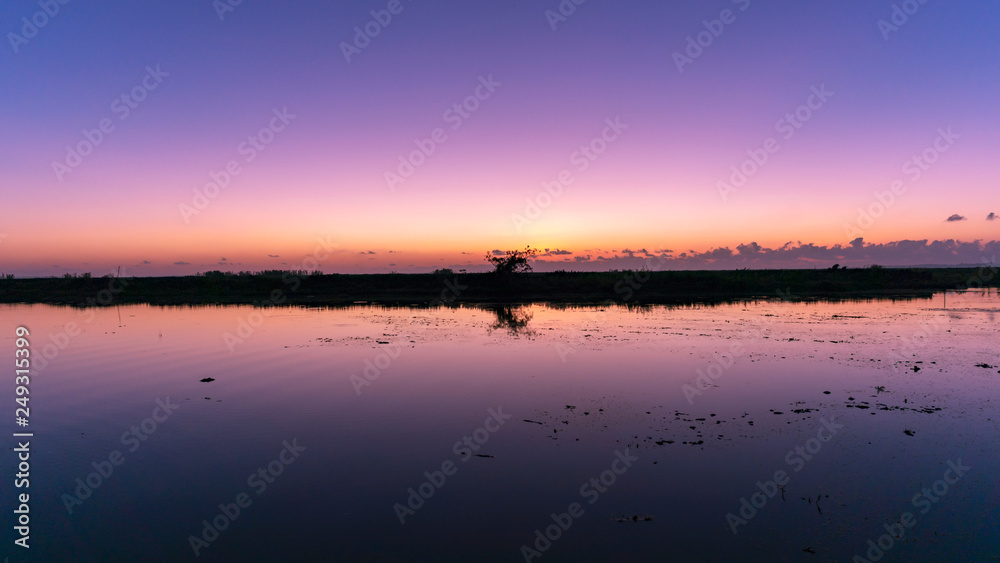 beautiful landscape nature view in morning with reflections during sunrise scenery