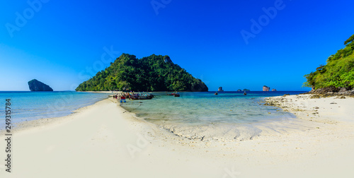 View to Chicken island. Paradise beach which connects 3 tropical islands together (Koh Kai, Koh Tup & Koh Mor). Andaman sea, Krabi province, Thailand.