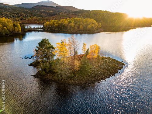 Aerial view of lonely Island in Loch Garry in the scottish Highlands, Scotland photo