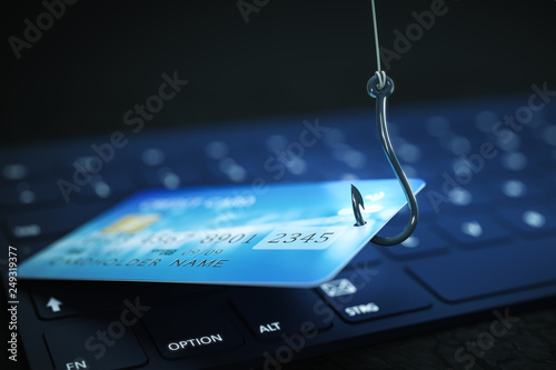 phishing credit card data with keyboard and hook symbol photo
