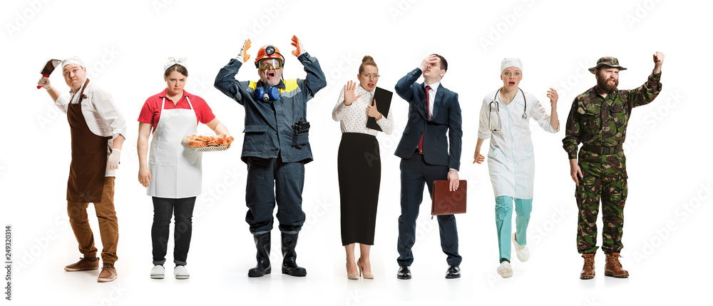 Obraz premium Workers strike concept. Collage of different professions. Group of angry men and women in uniform screaming at studio isolated on white background. Buisiness, professional concepts
