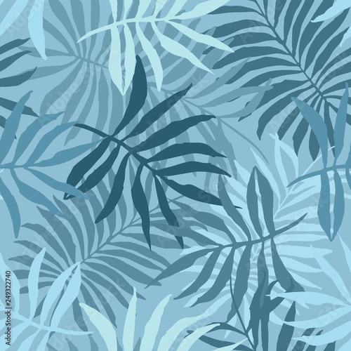 Elegant pastel blue seamless pattern with overlap mess of fern tropical leaves. Trendy exotic plants texture for textile, wrapping paper, surface, wallpaper, background