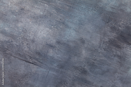 Canvas coated with aqua blue and grey acrylic paint with texture strokes. Abs...